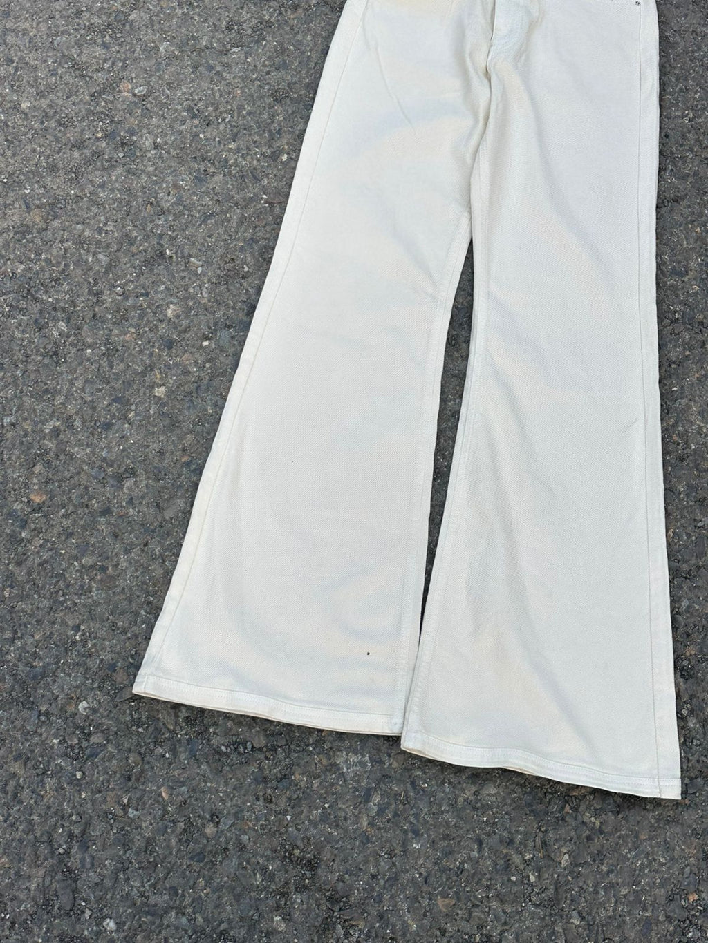 Cream flared jeans