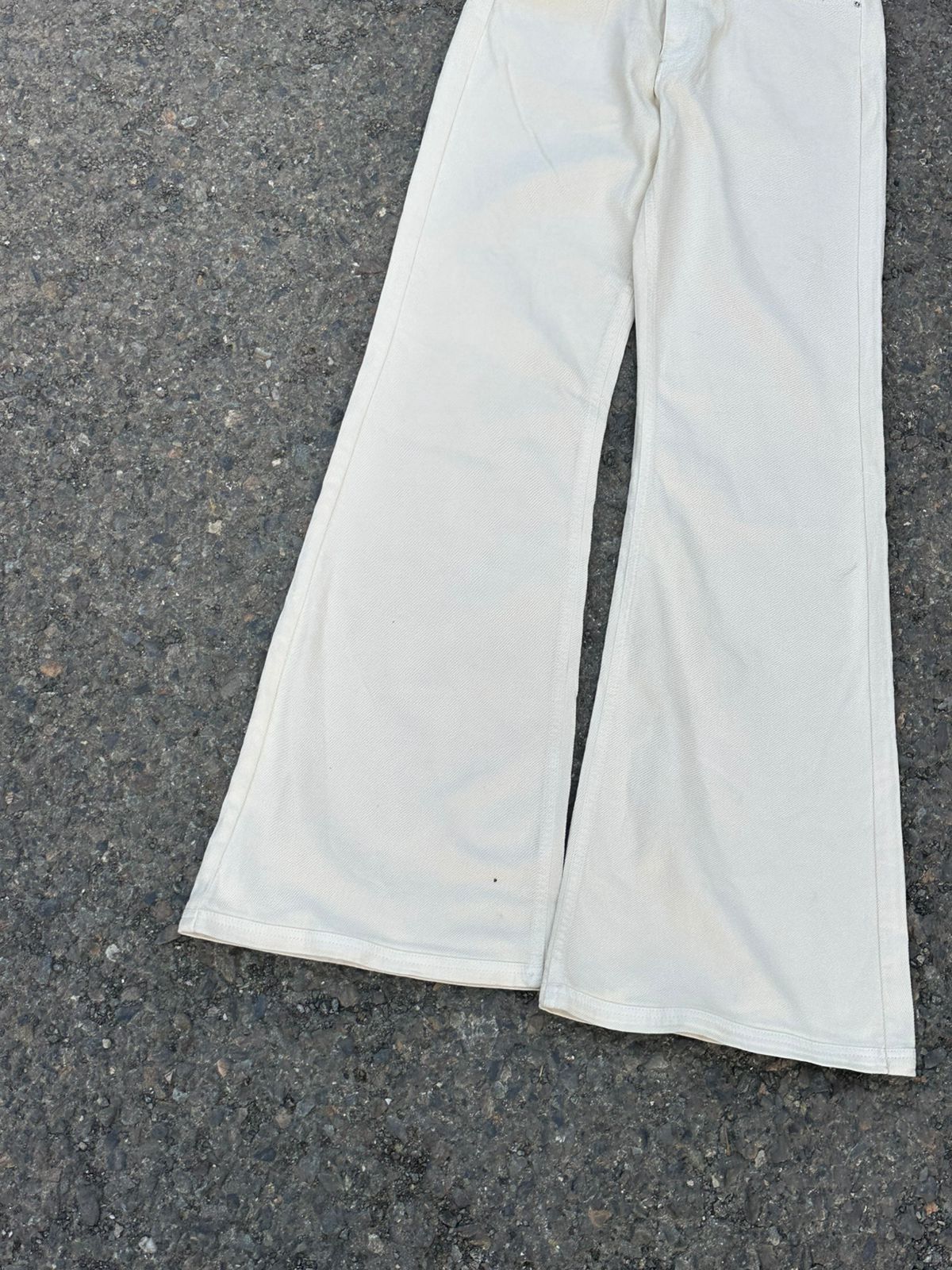 Cream flared jeans