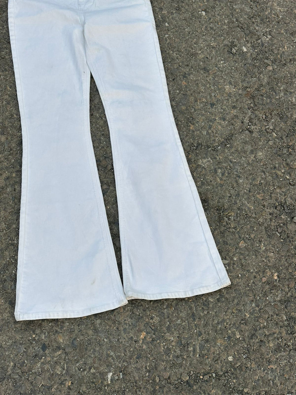 Cream flared jeans