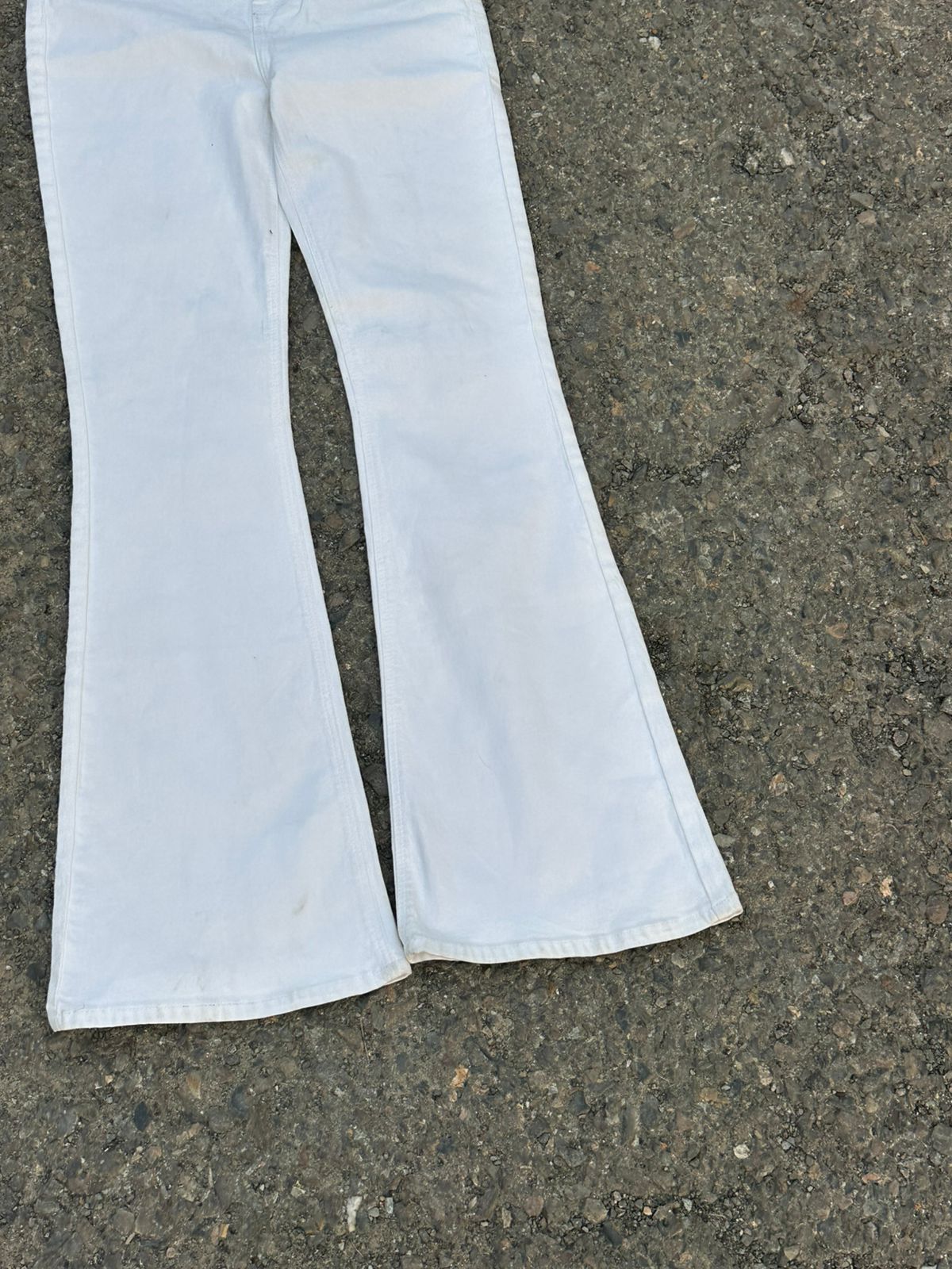 Cream flared jeans