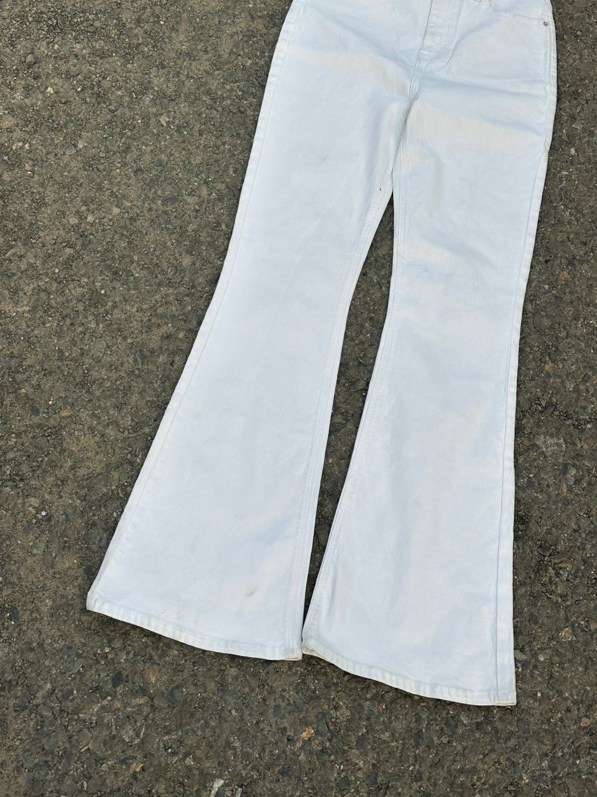 Cream flared jeans